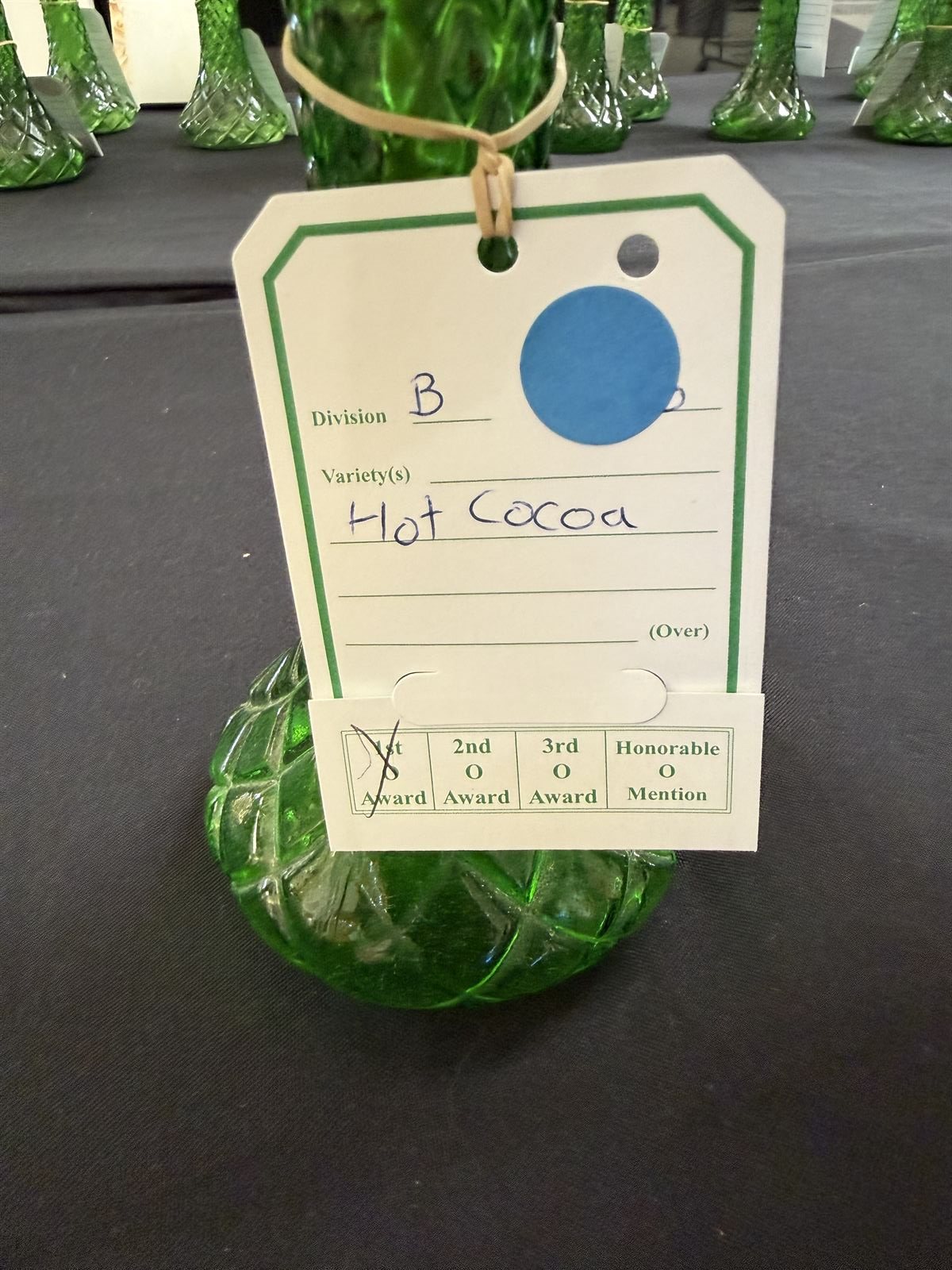 Close-up of the B6 Hot Cocoa entry tag showing the 1st Award marked